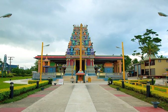 Garden Of Sleeping Giant ,Mudpool &Temple Tour From Coral Coast - Shopping at Nadi’s produce market