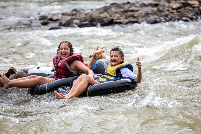 River Tubing Fiji, Navua River - Swimming beneath the waterfall