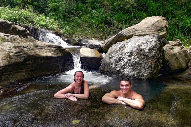Small Group Hiking Adventure - Hidden Peaks - Cooling off at the waterfall